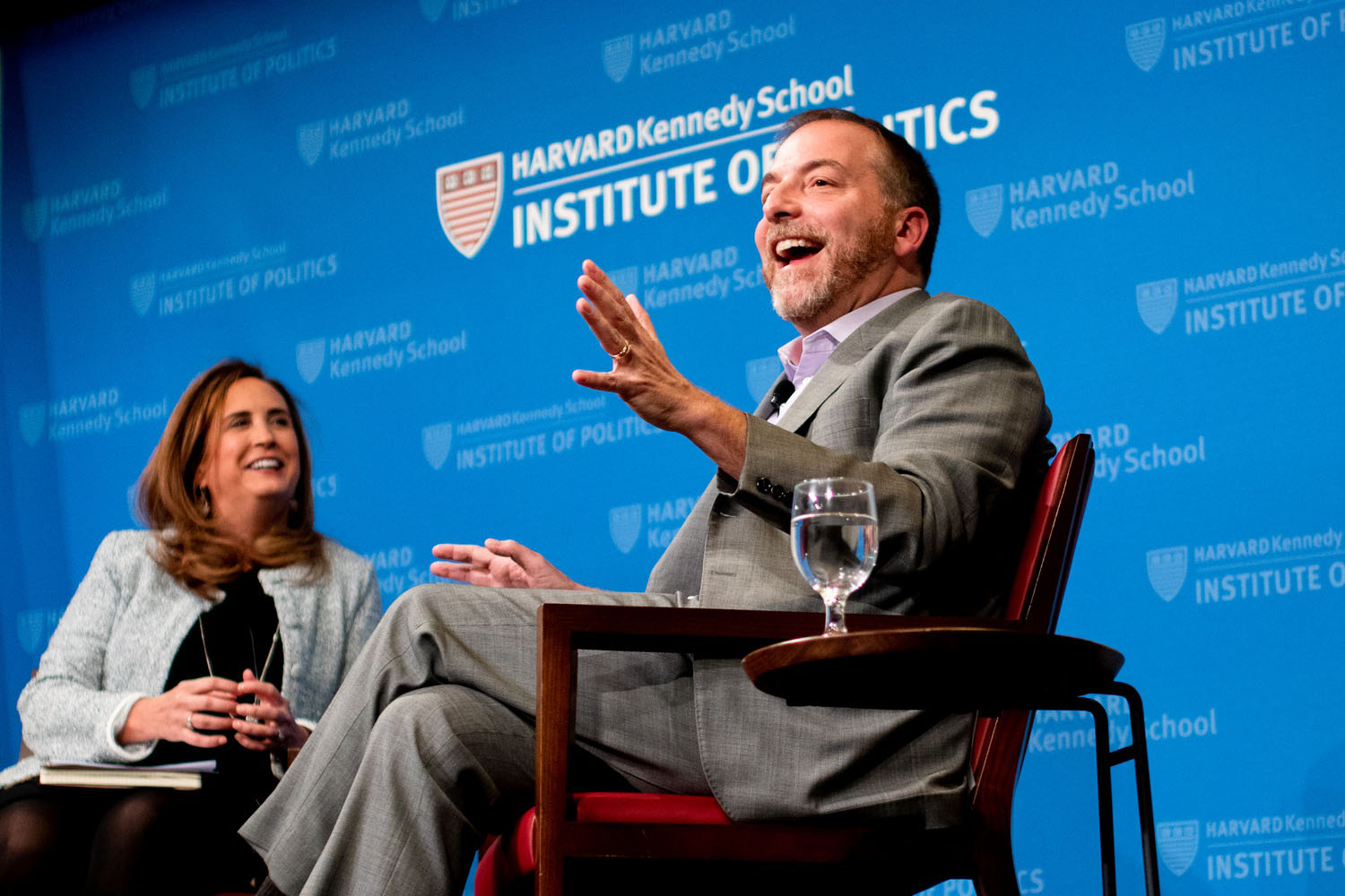 Chuck Todd speaks at a Harvard Institute of Politics forum, discussing the upcoming 2024 U.S. presidential election.