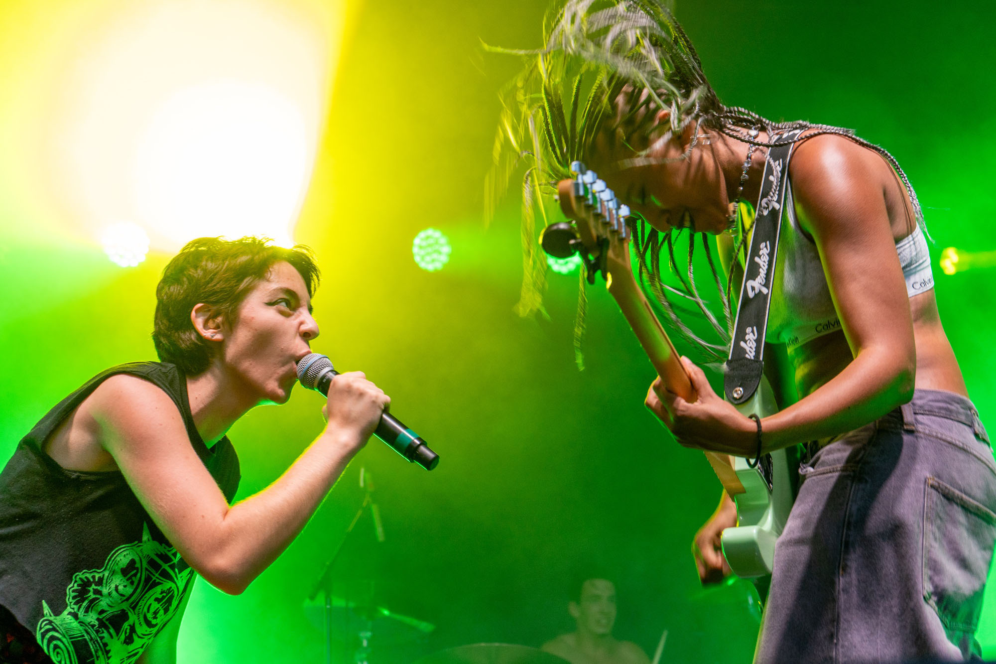 Sierra S. Stocker ’25 and Chloe M. Becker ’25 rock out during Crimson Jam as part of student punk band STRYK9.