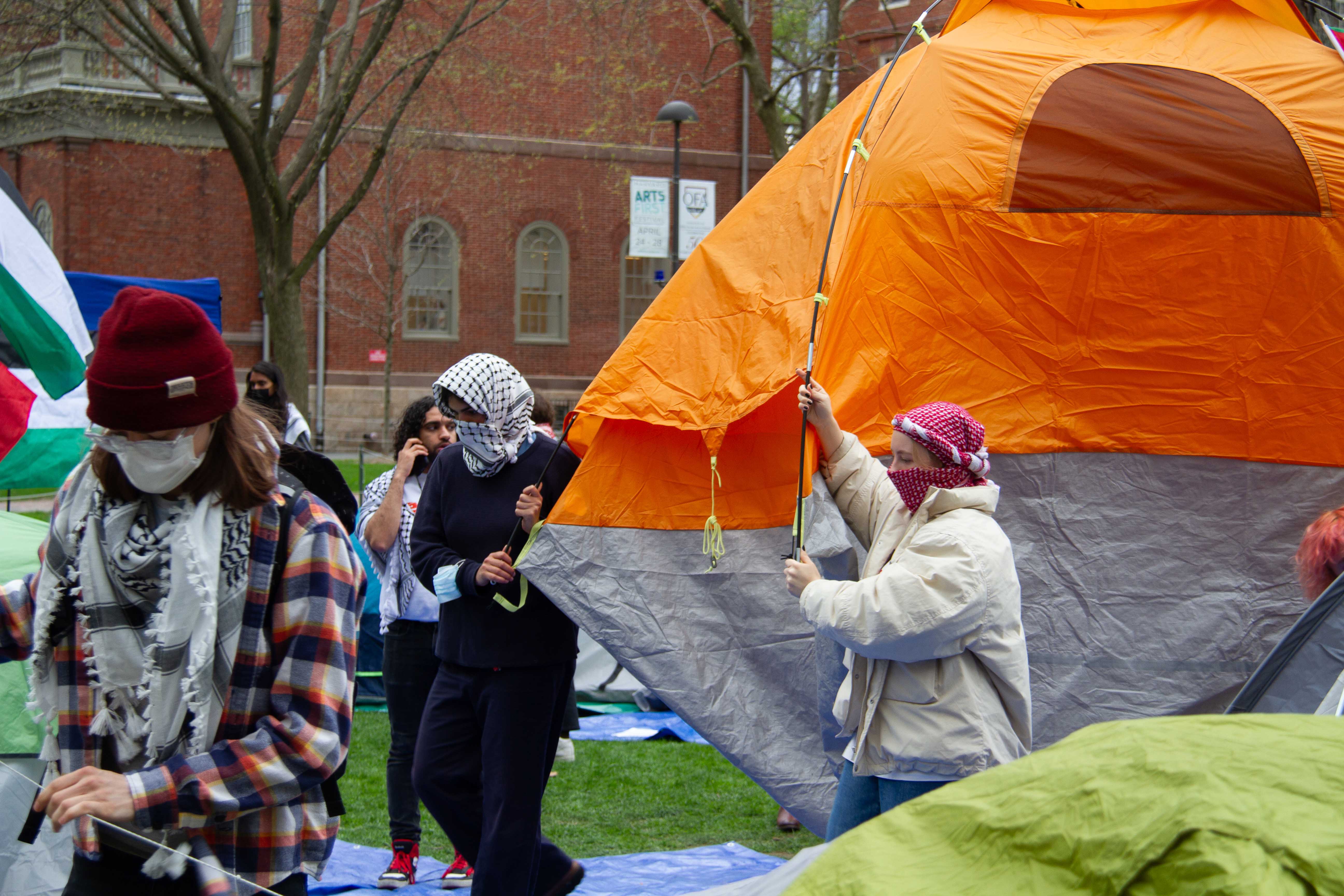 Pro-Palestine students occupied Harvard Yard in an encampment, demanding the University sever ties with Israeli institutions and companies  and protesting the College’s suspension of the Palestine Solidarity Committee. The encampment at Harvard came amid a nationwide surge of similar demonstrations across college and university campuses, including Columbia, Yale, and MIT.