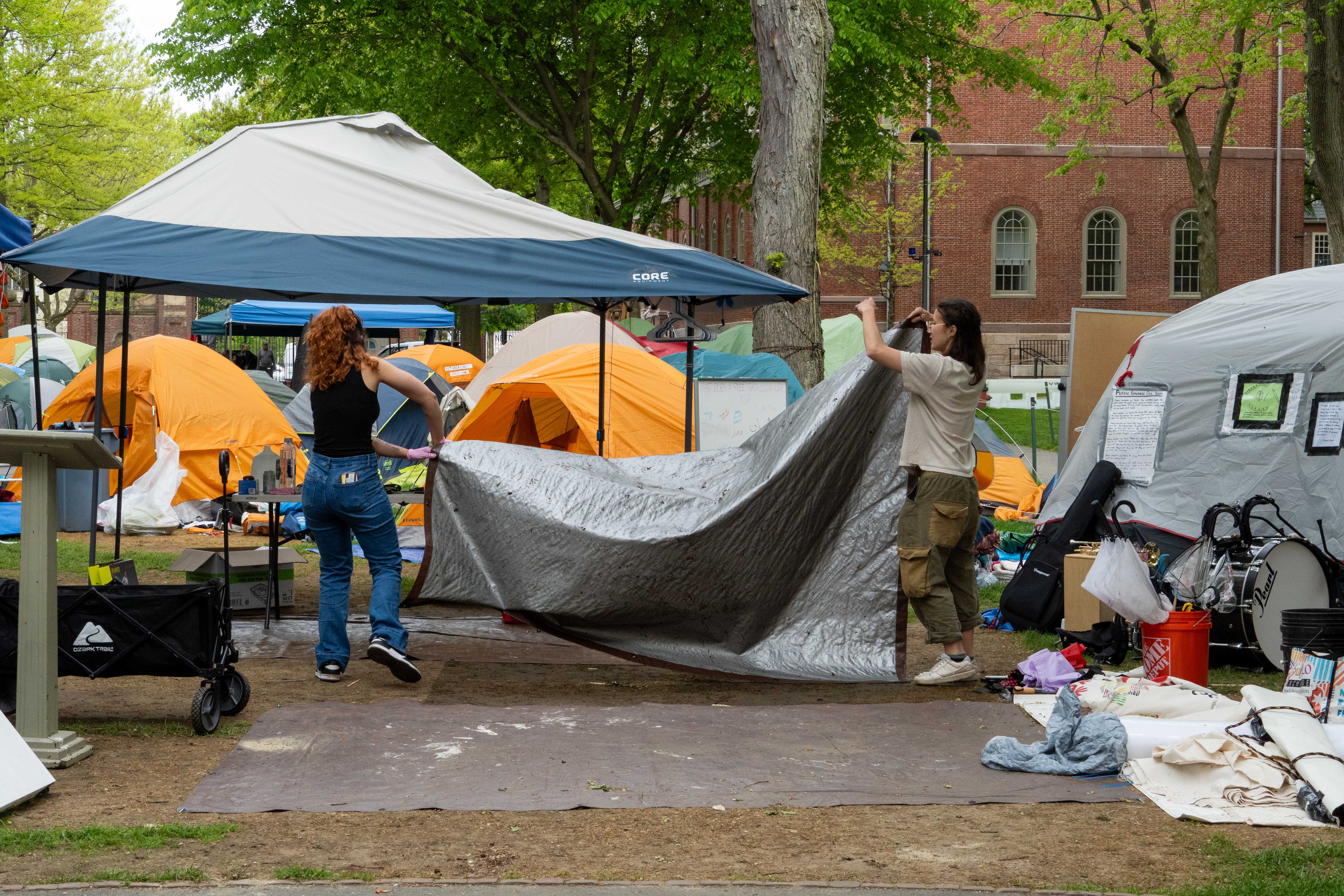 Protesters dismantle the Harvard Yard encampment after Harvard Out of Occupied Palestine announced they had reached an agreement with the University to end the encampment in exchange for reversing involuntary leaves of absence and holding conversations with University leadership around divestment. The end of the encampment paved the way for Commencement to proceed as planned.