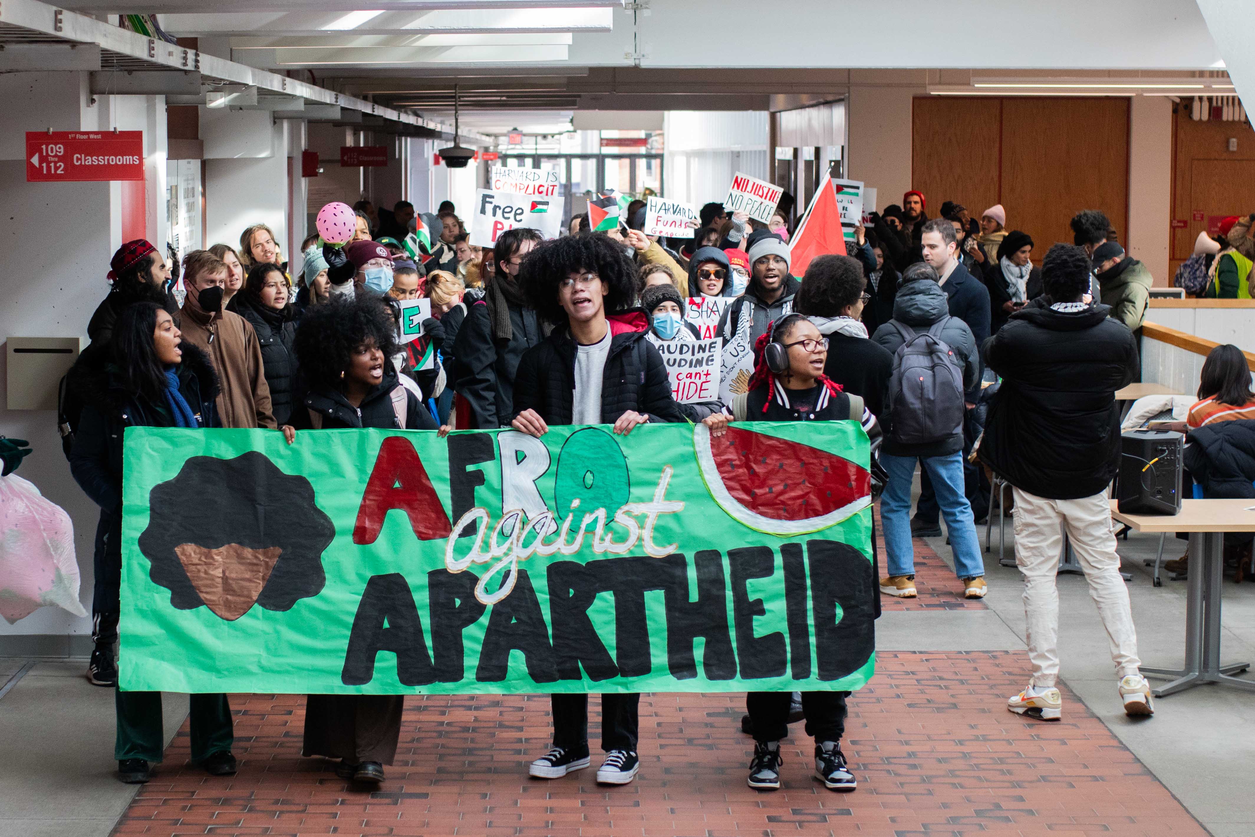 Protesters with the African and African American Resistance Organization march through the Science Center during the pro-Palestine week of action. AFRO is an unrecognized undergraduate group formed for Black student activism.