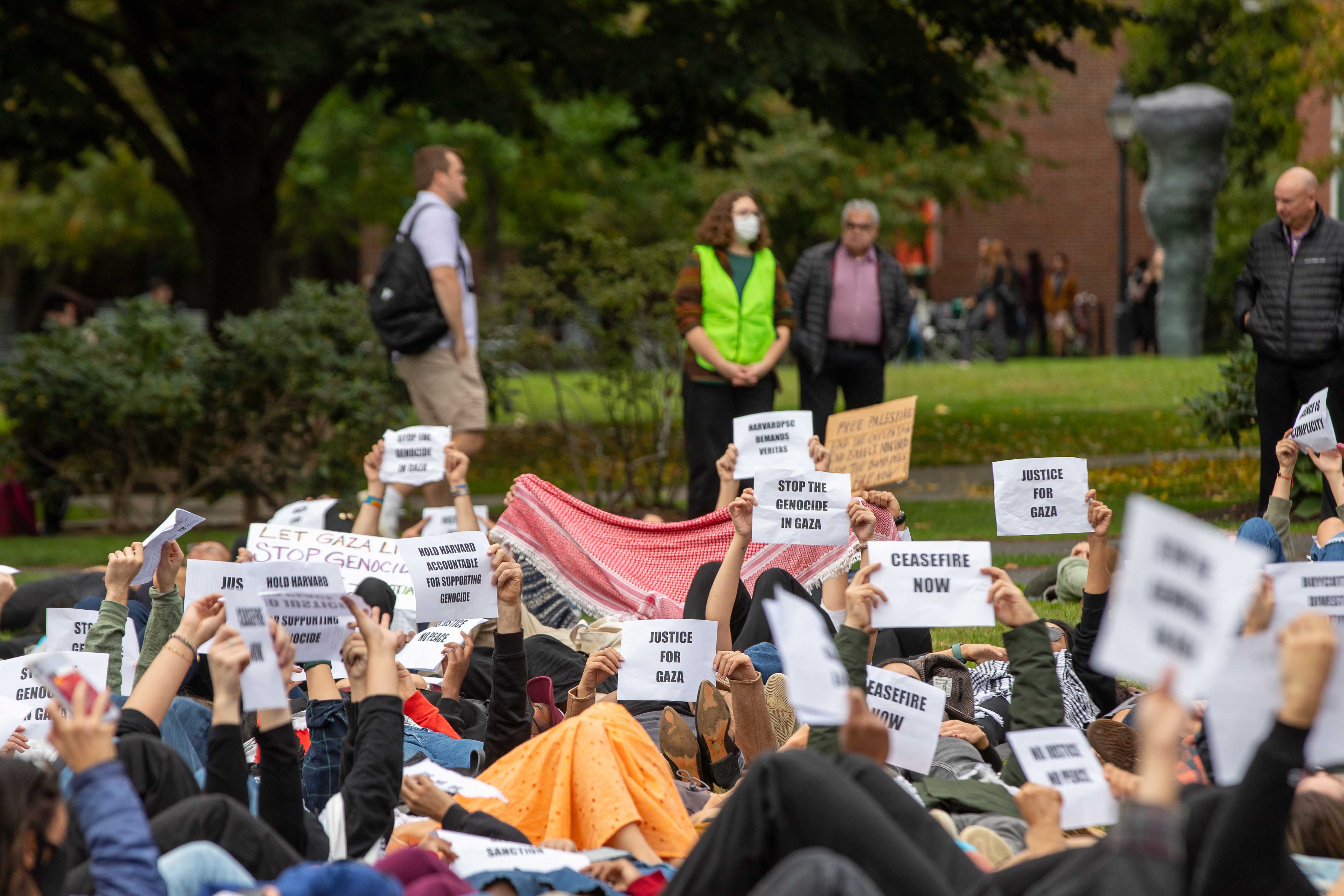 Hundreds of Harvard students and affiliates march to Harvard Business School, where they staged a “die-in” to demand an end to violence in Gaza and express solidarity with Palestine following the al-Ahli Baptist Hospital blast.