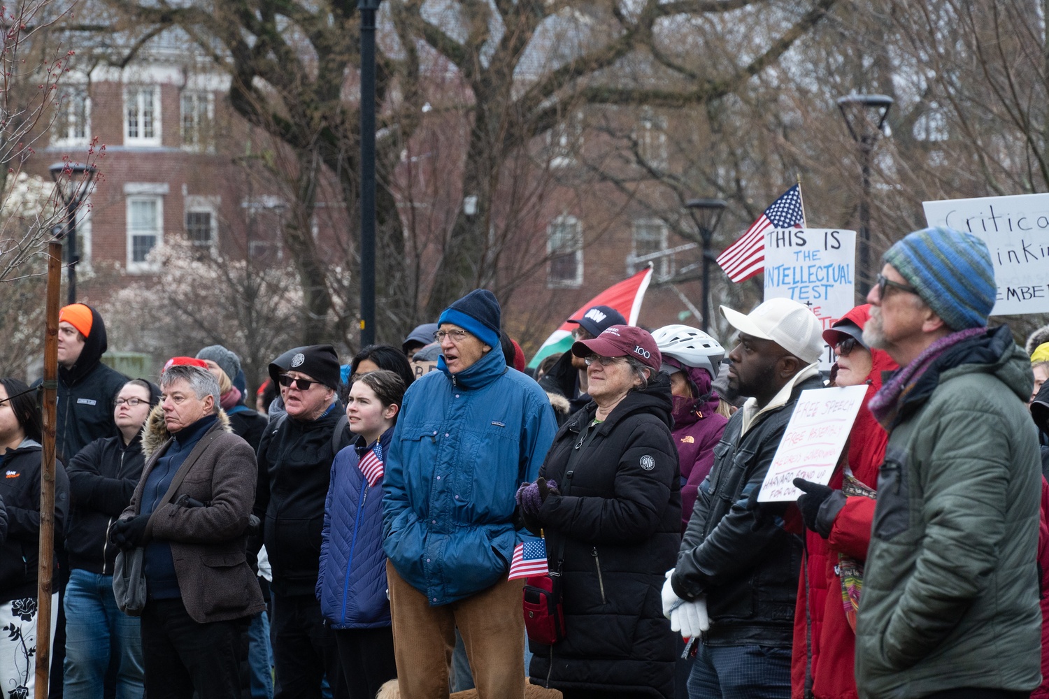 More than 500 Harvard affiliates and Cambridge residents gather on Cambridge Common in a rally to urge Harvard to stand up against President Donald Trump's demands. The rally was organized by the Cambridge City Council and the Harvard chapter of the American Association of University Professors.