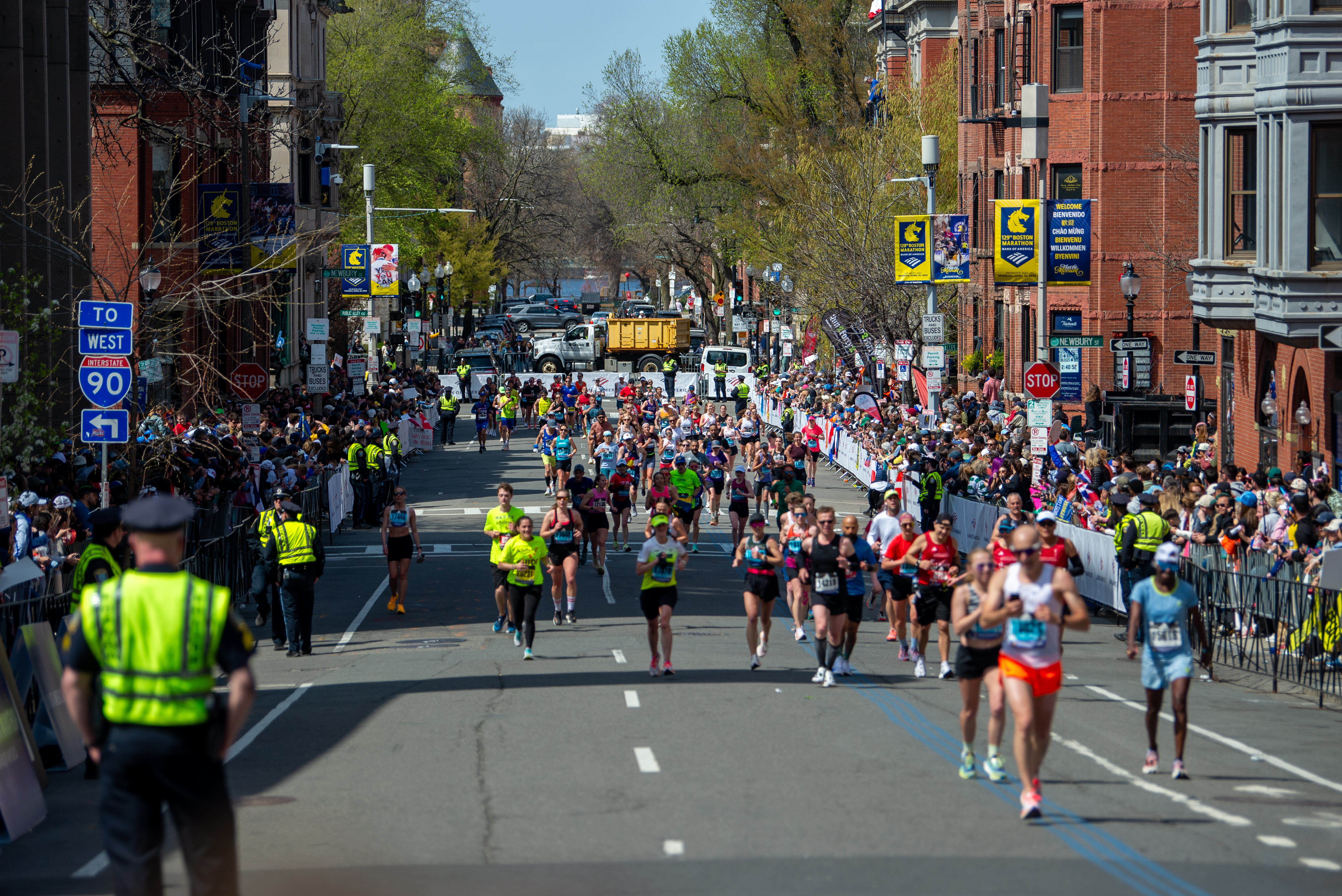 More than 30,000 runners, including Harvard students, make their way through downtown Boston for the 129th Boston Marathon, following the historic 26.2-mile course from Hopkinton to Copley Square.