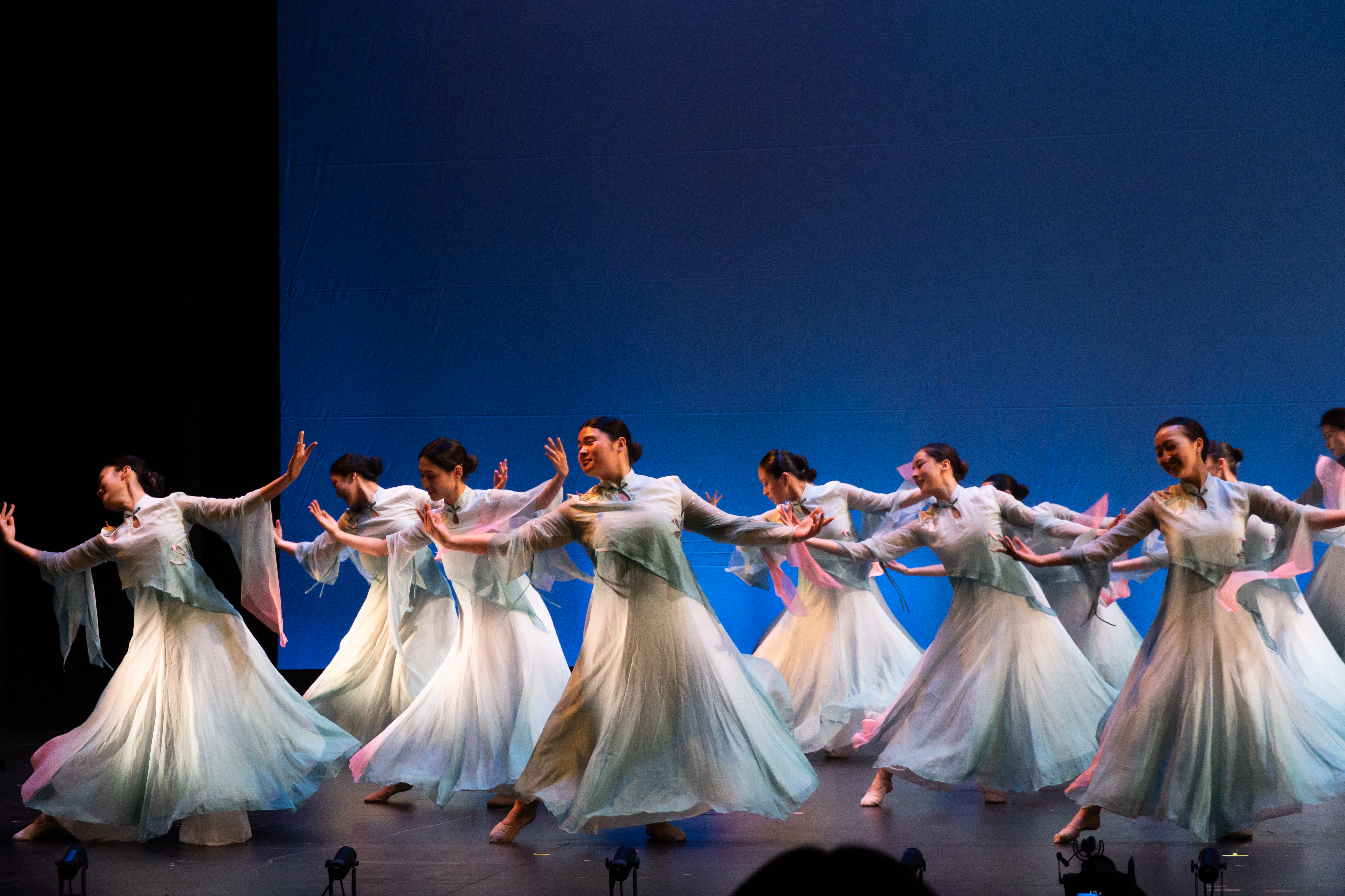 Dancers perform "Shadows Dancing on the Rocky Stream" in the Loeb Drama Center for the Asian American Dance Troupe's Eastbound 2025 show.