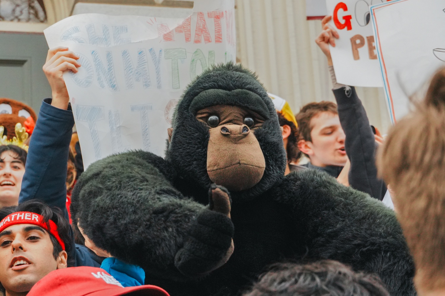 Harvard Yard comes to life with costumes, posters, and chants as upperclassmen from all 12 Houses storm freshman dorms for Housing Day – the College’s annual tradition of welcoming first-years into their residential communities.