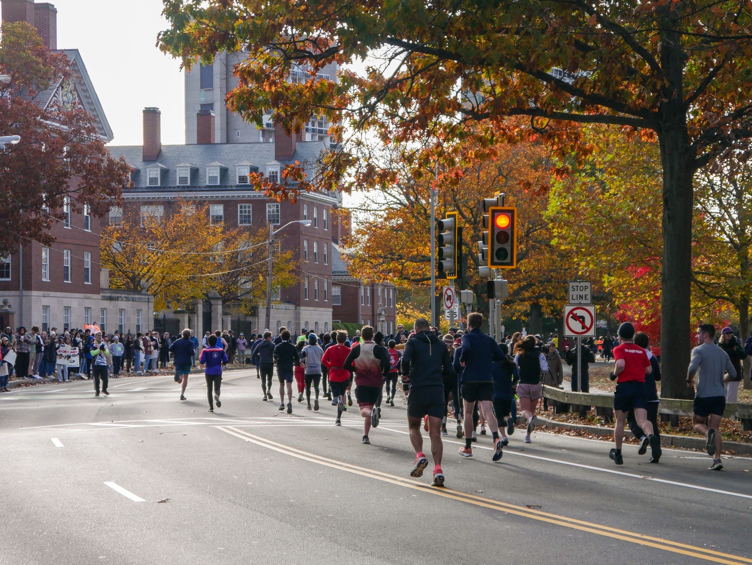 Runners pass through Cambridge during the city’s seventh annual Half Marathon and 5K. The race, which began at Cambridgeside, brought together nearly 11,000 participants and supporters.