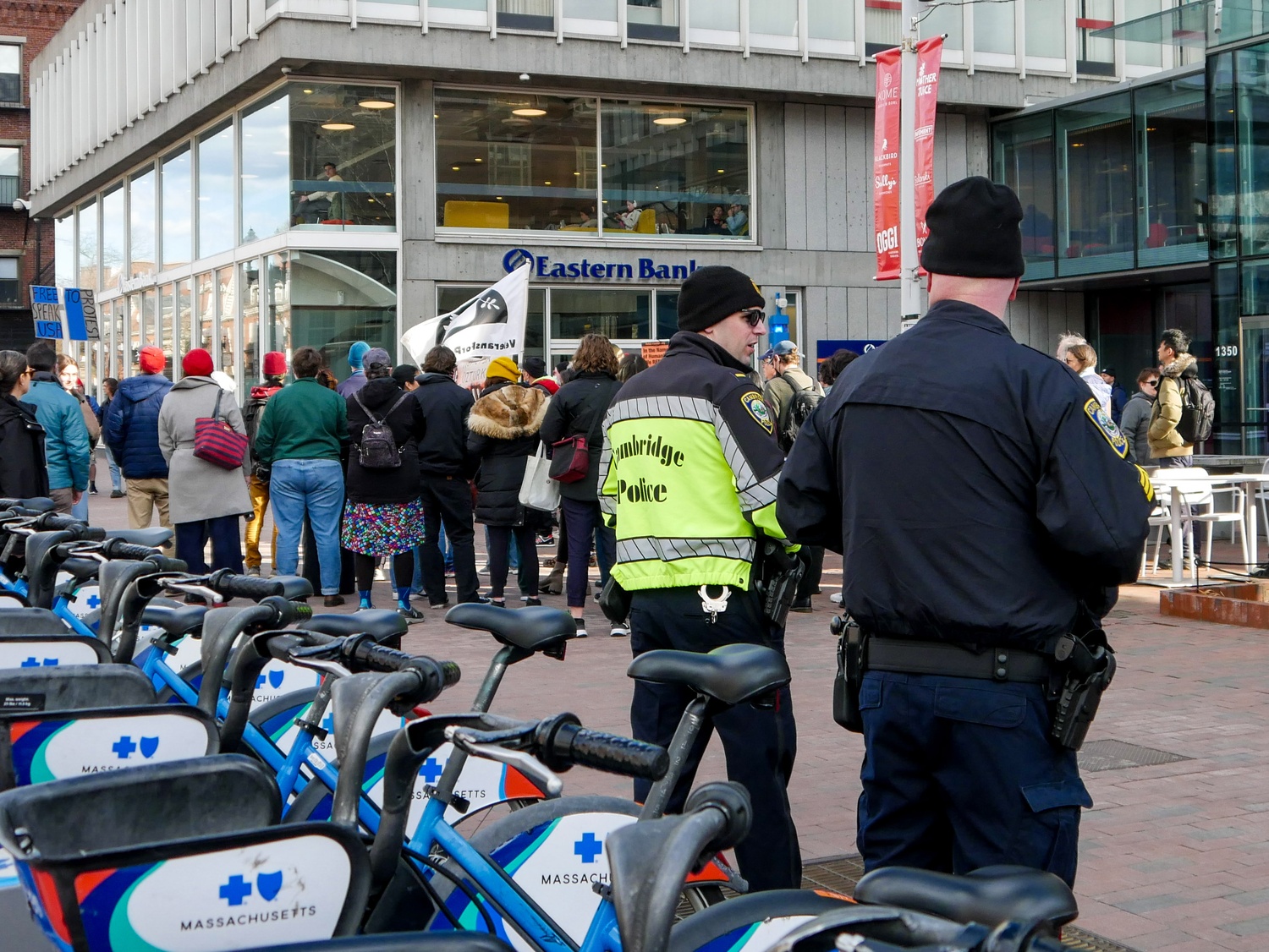 Cambridge police observe roughly 30 non-Harvard affiliates protesting outside the Smith Campus Center during a demonstration organized by Refuse Fascism, a New York-based activist group. The rally condemned the arrests of Columbia graduate student Mahmoud Khalil and Tufts graduate student Rumeysa Ozturk by federal immigration authorities.
