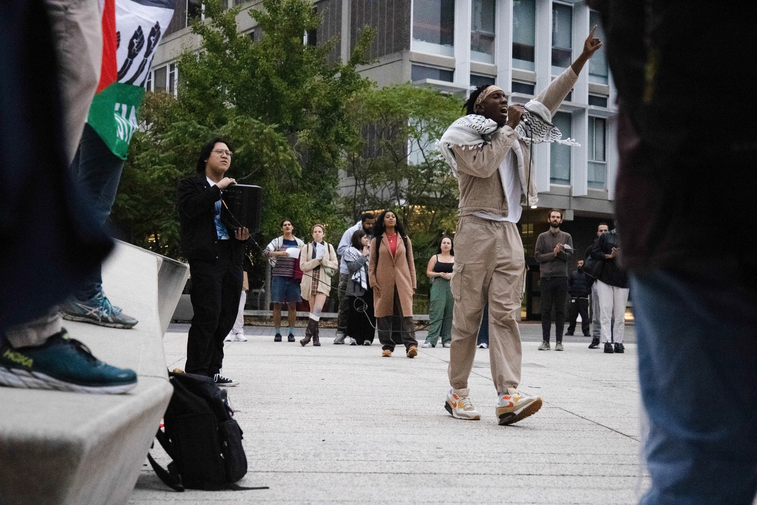 Days after a study-in protest at Widener Library, Kojo Acheampong ’26 leads demonstrators in Science Center Plaza at a Harvard Out of Occupied Palestine rally condemning Israeli strikes in Lebanon and criticizing the University’s response to student activism.